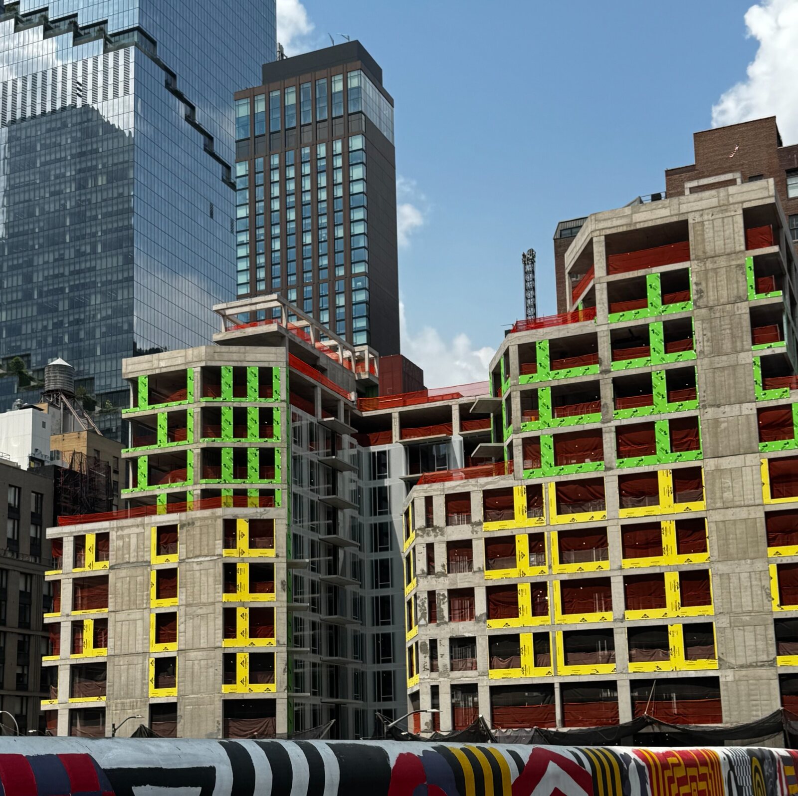 New York City concrete construction project with perimeter protection